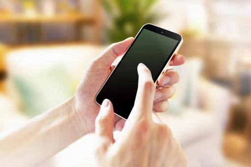 スマートフォンで予約する様子